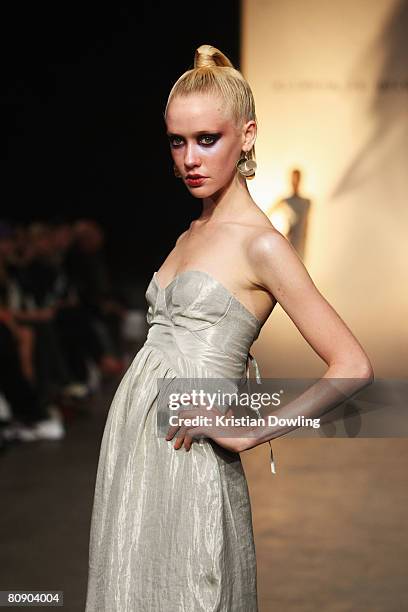 Model showcases an outift by designer Silence Is Golden on the catwalk during the second day of the Rosemount Australian Fashion Week Spring/Summer...