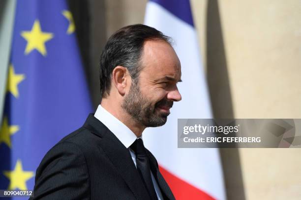 French Prime Minister Edouard Philippe leaves after the weekly cabinet meeting, on July 5, 2017 at the Elysee palace in Paris.