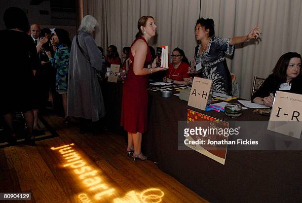 The guest check-in table is staffed at the fourth annual "Scribbles to Novels" gala to benefit Jumpstart April 28, 2008 in New York City.