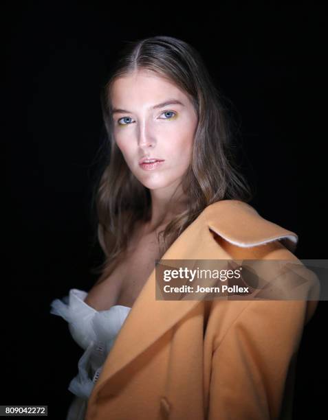 Model is seen backstage ahead of the Danny Reinke show during the Mercedes-Benz Fashion Week Berlin Spring/Summer 2018 at Kaufhaus Jandorf on July 5,...