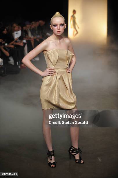 Model showcases an outift by designer Silence Is Golden on the catwalk during the second day of the Rosemount Australian Fashion Week Spring/Summer...