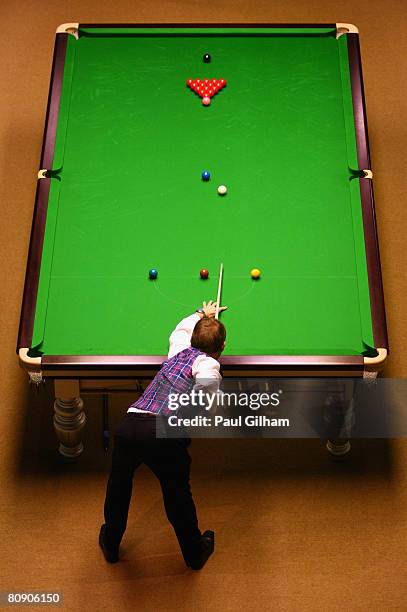 Stephen Hendry of Scotland breaks against Ryan Day of Wales during the quarter finals of the 888.com World Snooker Championships at the Crucible...