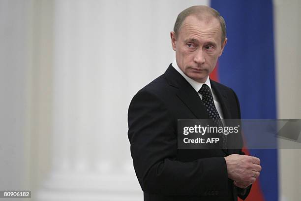 Russian President Vladimir Putin attends a state awards ceremony at the Kremlin in Moscow on April 29, 2008. Putin handed out dozens of state awards...