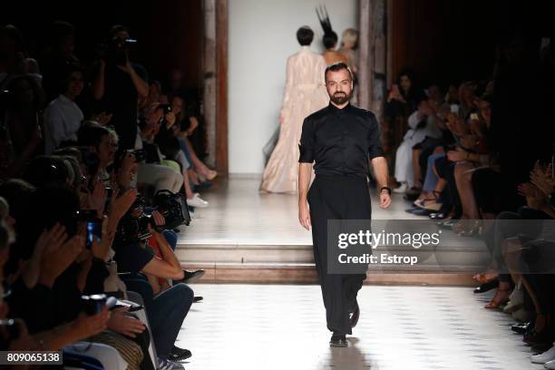 Julien Fournié walks the runway during the Julien Fournie Haute Couture Fall/Winter 2017-2018 show as part of Haute Couture Paris Fashion Week on...