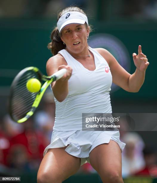 Irina Falconi of USA in action against Angelique Kerber of Germany on day two of the Wimbledon Lawn Tennis Championships at the All England Lawn...