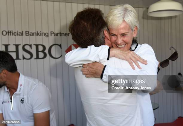 Judy Murray and Anton du Beke pose for pictures during a tennis lesson to promote HSBC's sponsorship of Wimbledon on HSBC Court 20 at the All England...