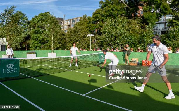 Tim Henman,Goran Ivanisevic, Judy Murray and Anton du Beke pose for pictures during a tennis lesson to promote HSBC's sponsorship of Wimbledon on...