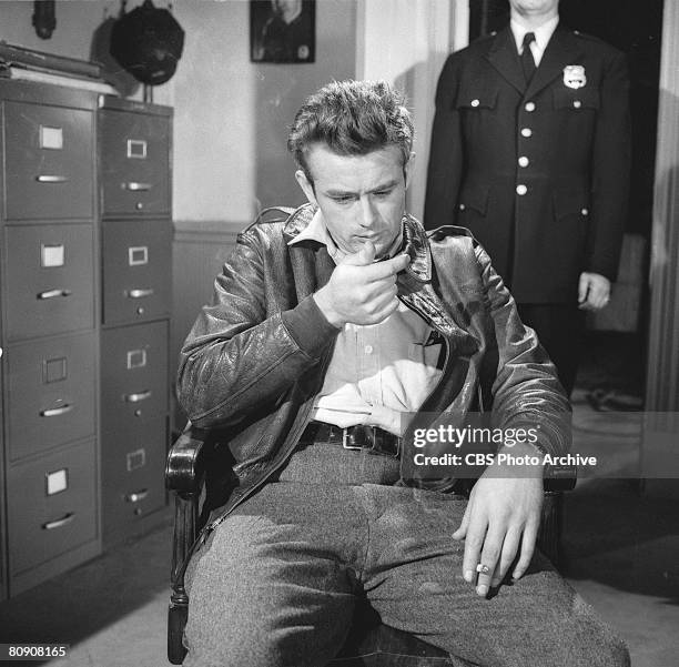 American actor James Dean slumps in a chair in a scene from an episode of the 'Schlitz Playhouse of Stars' entitled 'The Unlighted Road,' April 1,...