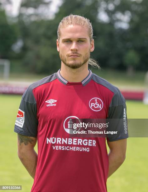 Rurik Gislason of 1. FC Nuernberg poses during the 1. FC Nuernberg team presentation at Sportpark Valznerweiher on July 3, 2017 in Nuremberg, Germany.