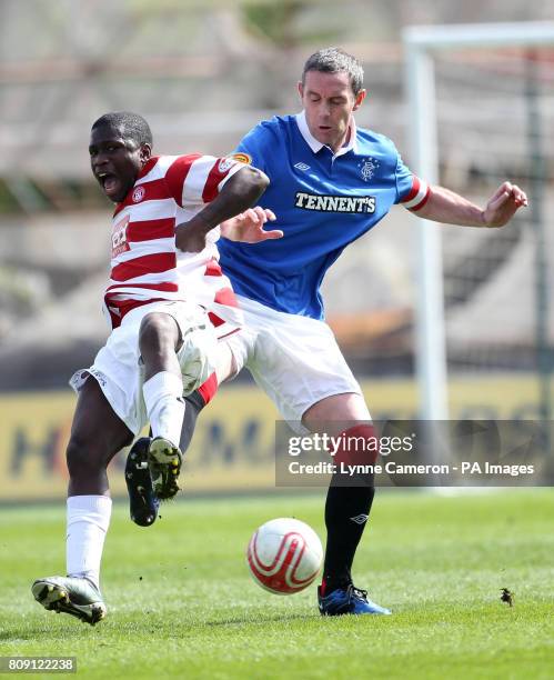 Ranger's David Weir and Hamilton's Nigel Hasselbaink during the Clydesdale bank Scottish Premier League match at New Douglas Park, Hamilton.