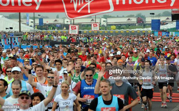 The mass start gets underway at Blackheath during the 31st Virgin London Marathon in London.