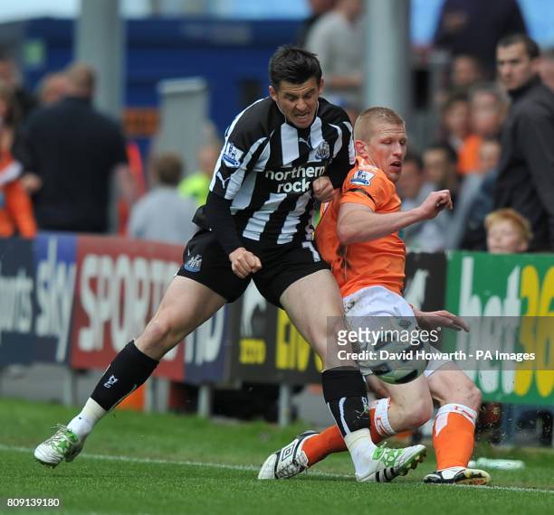 Newcastle United's Joey Barton and Blackpool's Keith Southern battle for the ball during the Barclays Premier League match at Bloomfield Road,...