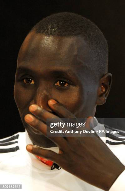 Winner of the Men's 2011 London Marathon Emmanuel Mutai speaks o the media during the 31st Virgin London Marathon winners photocall at Tower Hotel,...