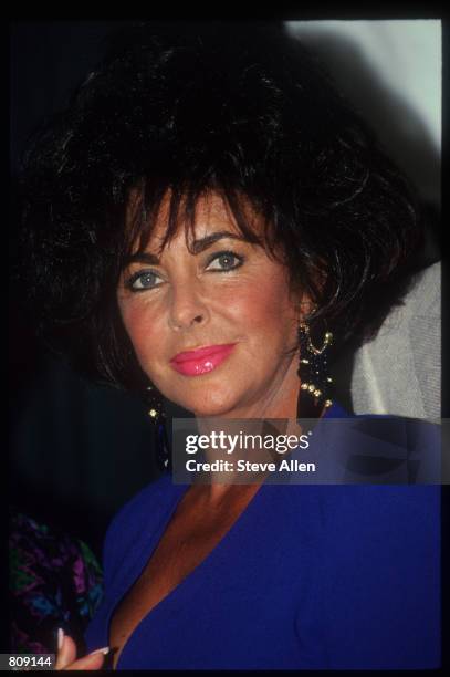 Elizabeth Taylor stands June 3, 1991 in New York City. Elizabeth Taylor, a longtime advocate for people with AIDS is the founding national chairman...