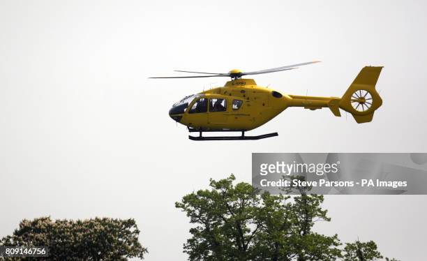 An Air Ambulance takes Elizabeth Power to hospital after she falls as she competes in the Cross Country stage during day four of the Badminton Horse...