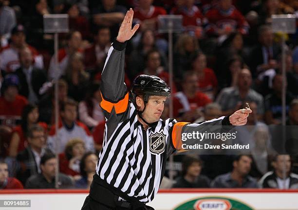 Referee Kevin Pollock makes a call during game seven of the 2008 NHL Eastern Conference Quarterfinals between the Boston Bruins and the Montreal...