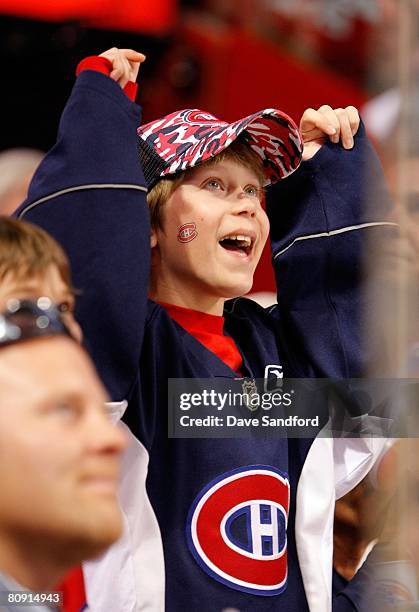 Young fan cheers on during game seven of the 2008 NHL Eastern Conference Quarterfinals between the Montreal Canadiens and the Boston Bruins on April...