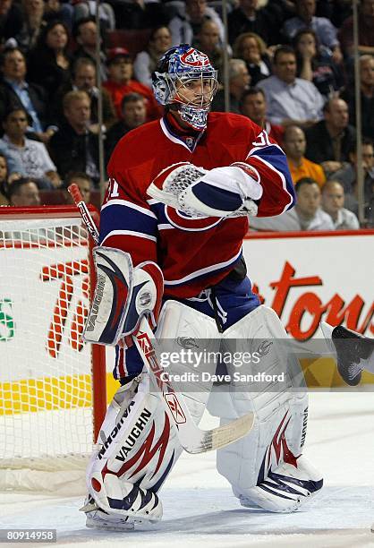 Goaltender Carey Price of the Montreal Canadiens defends his net against the Boston Bruins during game seven of the 2008 NHL Eastern Conference...