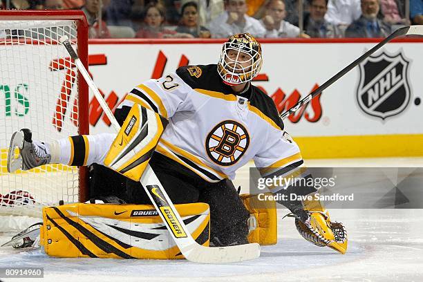 Goalkeeper Tim Thomas of the Boston Bruins defends his net against the Montreal Canadiens during game seven of the 2008 NHL Eastern Conference...