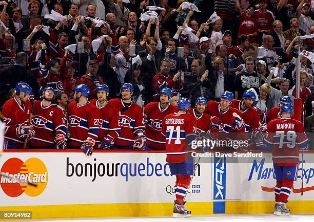 The Montreal Canadiens skate by the bench area to celebrate during game seven of the 2008 NHL Eastern Conference Quarterfinals against the Boston...