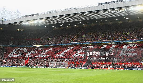 Manchester United fans holds up a sign reading Believe ahead of the UEFA Champions League Semi-Final second leg match between Manchester United and...