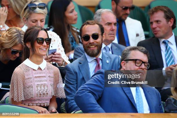 Pippa and James Middleton look on from the centre court royal box on day three of the Wimbledon Lawn Tennis Championships at the All England Lawn...