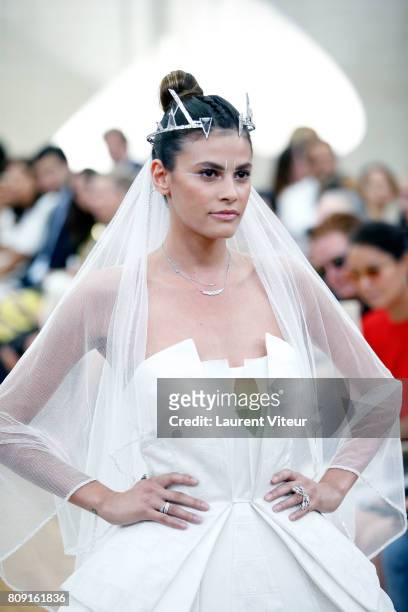 Model Alisar Ailabouni walks the runway during the Gyunel Haute Couture Fall/Winter 2017-2018 show as part of Haute Couture Paris Fashion Week on...