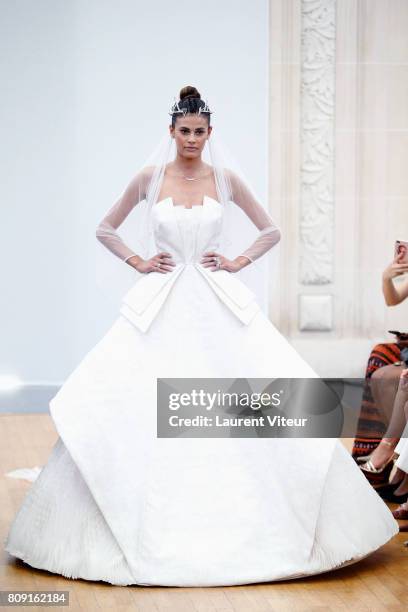 Model Alisar Ailabouni walks the runway during the Gyunel Haute Couture Fall/Winter 2017-2018 show as part of Haute Couture Paris Fashion Week on...