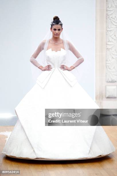 Model Alisar Ailabouni walks the runway during the Gyunel Haute Couture Fall/Winter 2017-2018 show as part of Haute Couture Paris Fashion Week on...