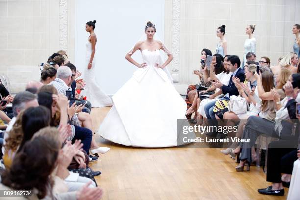 Model Alisar Ailabouni walks the runway during the Gyunel Haute Couture Fall/Winter 2017-2018 show as part of Haute Couture Paris Fashion Week on...