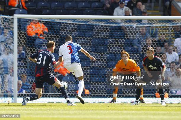 Blackburn Rovers' Martin Olsson scores the first goal of the game past Bolton Wanderers' goalkeeper Adam Bogdan