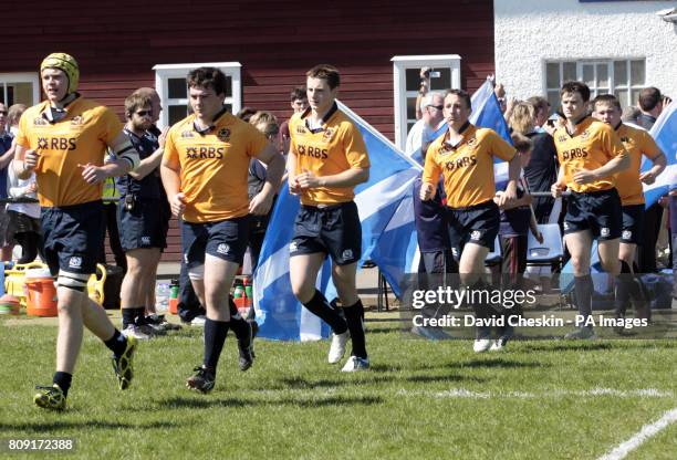 The Scotland team runs out during the International Under 17's match at Etterickhaugh Road, Selkirk.