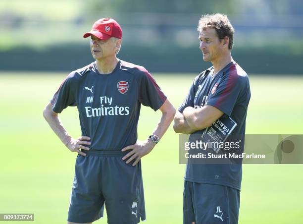 Arsenal manager Arsene Wenger with 1st team coach Jen Lehmann during a training session at London Colney on July 5, 2017 in St Albans, England.