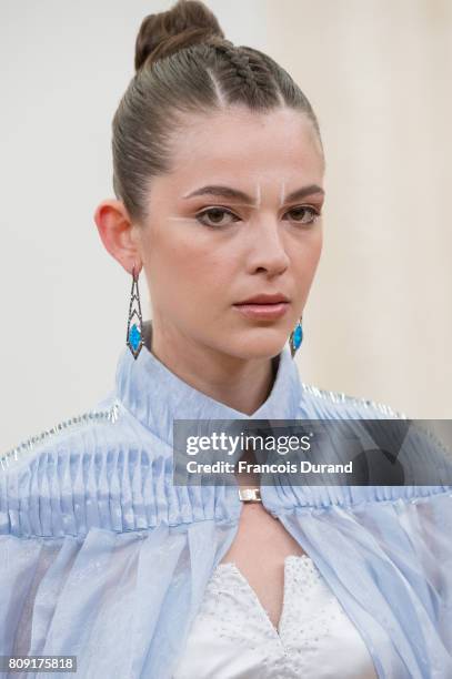 Model walks the runway during the Gyunel Haute Couture Fall/Winter 2017-2018 show as part of Haute Couture Paris Fashion Week on July 5, 2017 in...