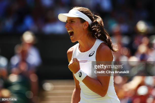Johanna Konta of Great Britain celebrates during the Ladies Singles second round match against Donna Vekic of Croatia on day three of the Wimbledon...