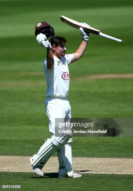 Rory Burns of Surrey celebrates his century during day three of the Specsavers County Championship Division One match between Surrey and Hampshire at...