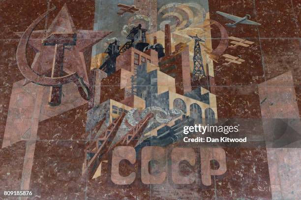 Soviet Mural with the letter 'CCCP' above the entrance to a metro station on Independence Avenue on July 04, 2017 in Minsk, Belarus. The post-Soviet...
