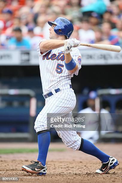 David Wright of the New York Mets bats during the game against the Milwaukee Brewers at Shea Stadium in Flushing, New York on April 12, 2008. The...