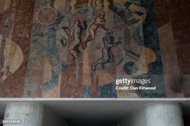 Mural above the entrance to a metro station on Independence Avenue depicts images of space exploration on July 04, 2017 in Minsk, Belarus. The...