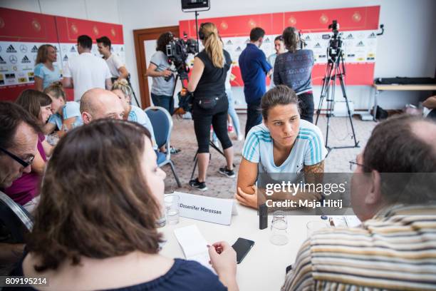 Dzsenifer Marozsan listens to a question of a reporter during Germany Women's National Soccer Team Media Day on July 5, 2017 in Heidelberg, Germany.