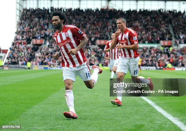 Stoke City's Jermaine Pennant celebrates scoring their second goal of the game with team-mate Jonathan Walters in front of the Arsenal fans