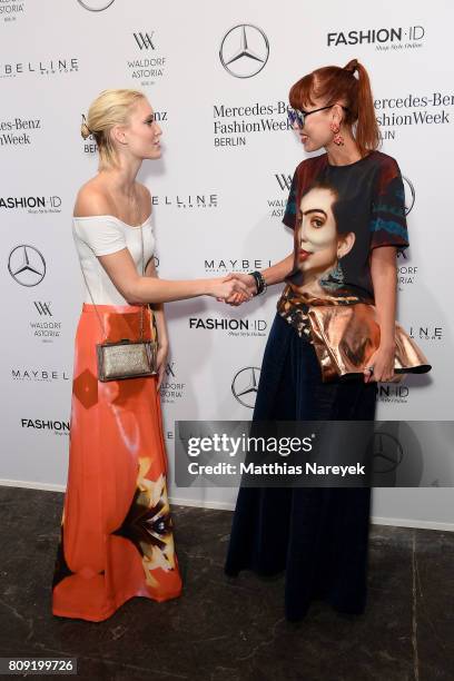 Model Kim Hnizdo and Sussan Zeck attend the Rebekka Ruetz show during the Mercedes-Benz Fashion Week Berlin Spring/Summer 2018 at Kaufhaus Jandorf on...