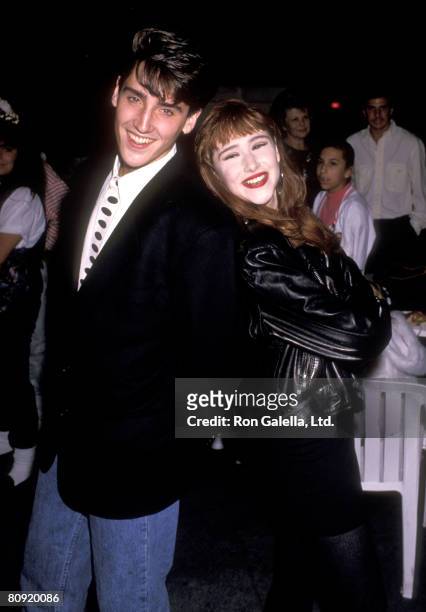 Musicians Jonathan Knight and Tiffany attend Tiffany's 18th Birthday Party on October 8, 1989 at Mel's Diner in Universal City, California.