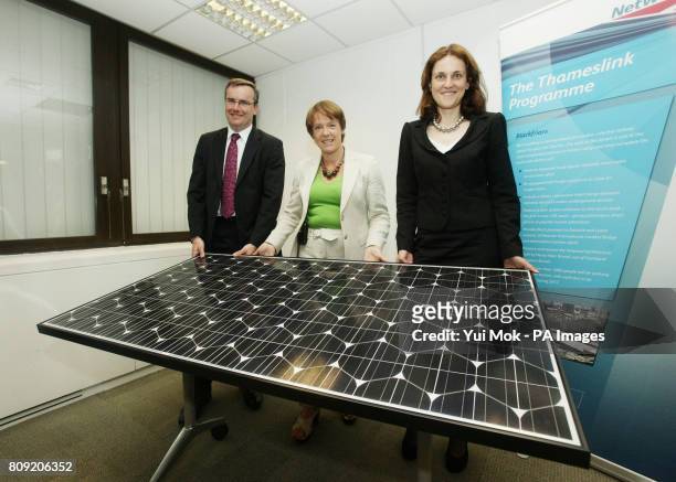 Environment Secretary Caroline Spelman , Rail Minister Theresa Villiers and Network Rail Director of Investment Projects Simon Kirby holding one of...