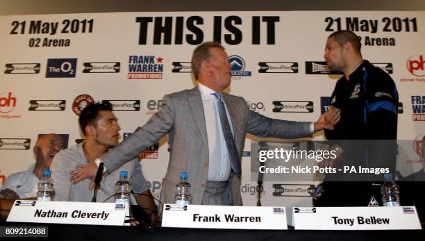 Boxing promoter Frank Warren keeps Wales' Nathan Cleverly and his challenger Liverpool's Tony Bellew apart at head to head press confrence at the...