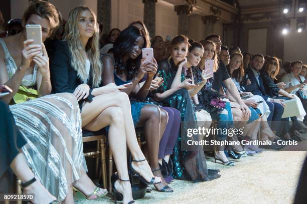 Elena Perminova, Karidja Toure, Deborah Francois, Clotilde Courau, Roxane Mesquida, Olivia Palermo and Carine Roitfeld attend the Elie Saab Haute...