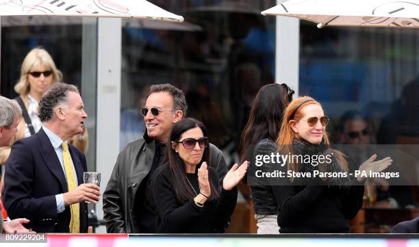 Bruce SpringSteen with his wife Patti watch Jessica Springsteen riding Cinncinnati La Silla competes in the The Royal Windsor Grand Prix during day...