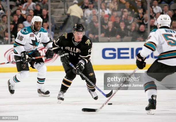 Brad Richards of the Dallas Stars skates against Craig Rivet of the San Jose Sharks during game three of the 2008 NHL Western Conference semi-final...