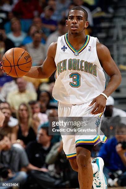 Chris Paul of the New Orleans Hornets drives the ball down the court against the Dallas Mavericks in Game Five of the Western Conference...
