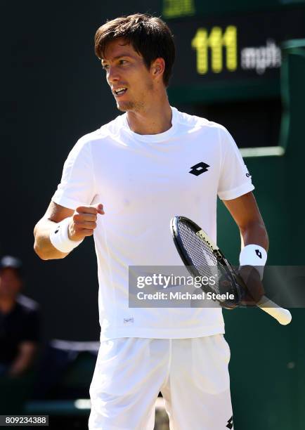 Aljaz Bedene of Great Britain acknowledges the crowd as he celebrates victory after the Gentlemen's Singles second round match against Damir Dzumhur...